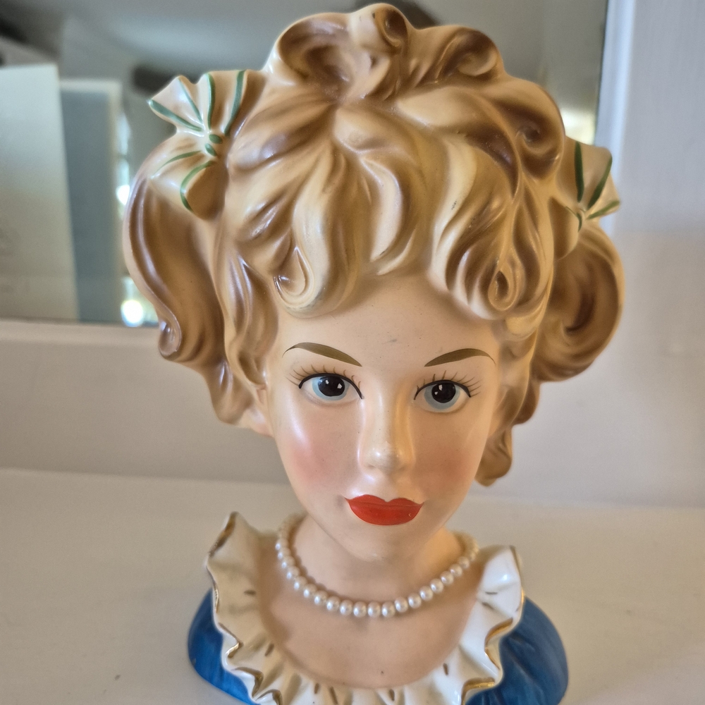 Charming Ceramic Bust with Blonde Hair and Blue Base